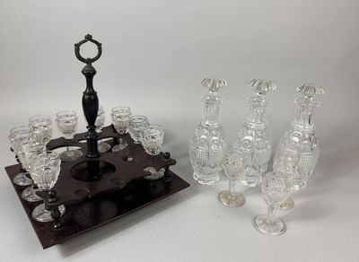 a lot of glass items that are sitting on a table