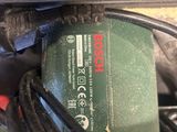 a cord connected to the battery of a corded drill