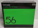 a close up of a box on a white surface with a green background