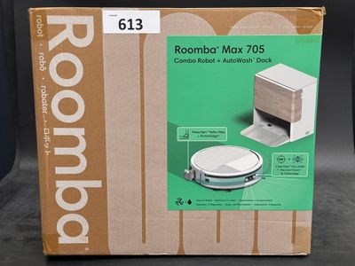 a cardboard box with a picture of a roomba on it