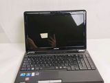 a laptop computer that is sitting on a table