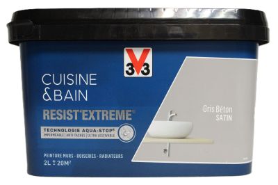 un gros plan sur un pot de peinture blanche sur fond blanc