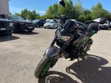 a motorcycle that is parked in a parking lot