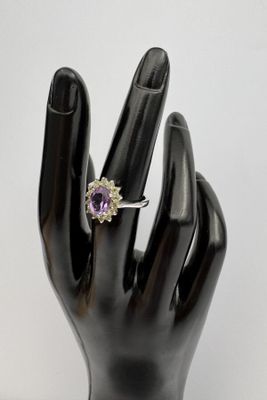 Bague argent 925 sertie d'une améthyste ovale en son centre,…