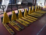 a lot of pallets that are lined up in a warehouse