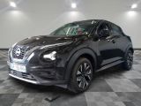 the black nissan c - hr is parked on a checkered floor