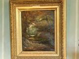 un tableau accroché au mur d'une pièce aux murs bleus