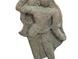 statue of a man carrying a woman on his back