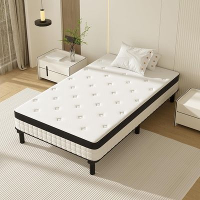 a bed that has a mattress on it in a room