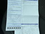 a picture of a car seat with a checkbook on it