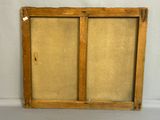an old wooden frame with a window on top of it