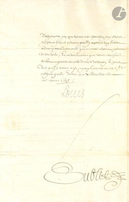 un vieux document sur lequel figure une lettre manuscrite