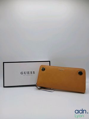 guess long wallet in tan leather with a card holder