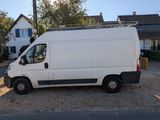a white van parked on the side of the road