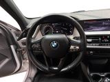 the interior of a car with a steering wheel, dashboard, and dash board