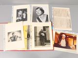 several old photographs of women and men are on a table