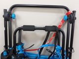 a blue bag that has a pair of skis in it