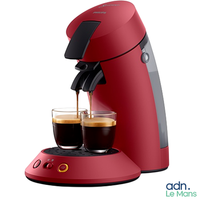 an image of a red coffee maker with two cups of coffee