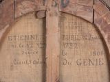 a wooden door that has a sign on it