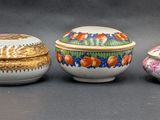 five different types of vases sitting on a table
