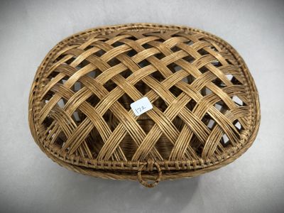 an image of a wicker basket with a tag on it