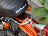 a close up of a motorcycle parked on the side of the road