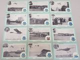 plusieurs photos en noir et blanc d'avions et de personnes posées sur une table