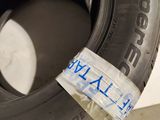 a close up of a tire with some tape on it