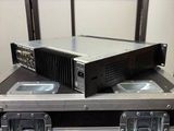 two hard cases that are stacked on top of each other