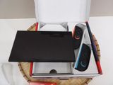 a box with a game controller and a box with a game controller in it