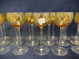 a lot of wine glasses sitting on a table