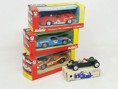 three toy cars that are stacked on top of each other