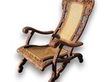 wooden rocking chair with wicker seat and arm rest