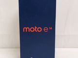 a close up of a motorola e4 box on a white surface