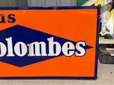 a sign that says columbuses on it in front of a store