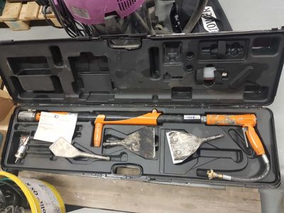 a tool case with tools in it sitting on a table
