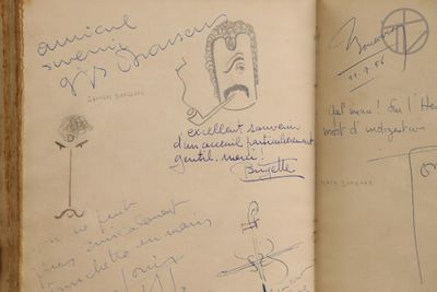 an open book with a drawing of a man holding a baseball bat