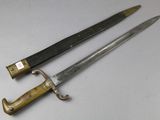 pair of two old swords on a white surface