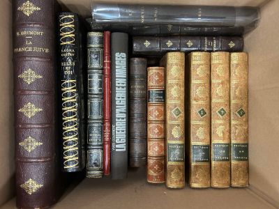 a box full of books that are sitting on a table