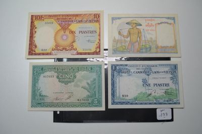 four different types of currency are displayed on a white surface
