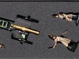 une boîte contenant un pistolet jouet et d'autres objets