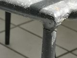 a table that has been covered with snow on it