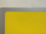 a picture of a picture of a yellow and gray sign