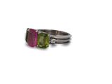 an image of a close up of a ring with two stones