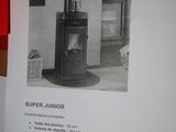a sign on the wall that says it is a wood burning stove
