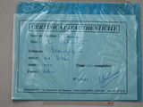 a certificate on a piece of plastic on the wall
