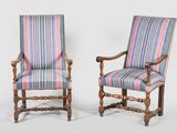 a pair of 19th century style armchairs with striped upholstered seats