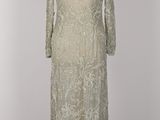 a white lace dress with long sleeves on a mannequin mannequin mannequin mannequin mannequin mannequin mannequin manne