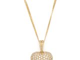 a diamond heart pendant on a gold chain