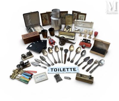 a lot of silverware and other items that are on display